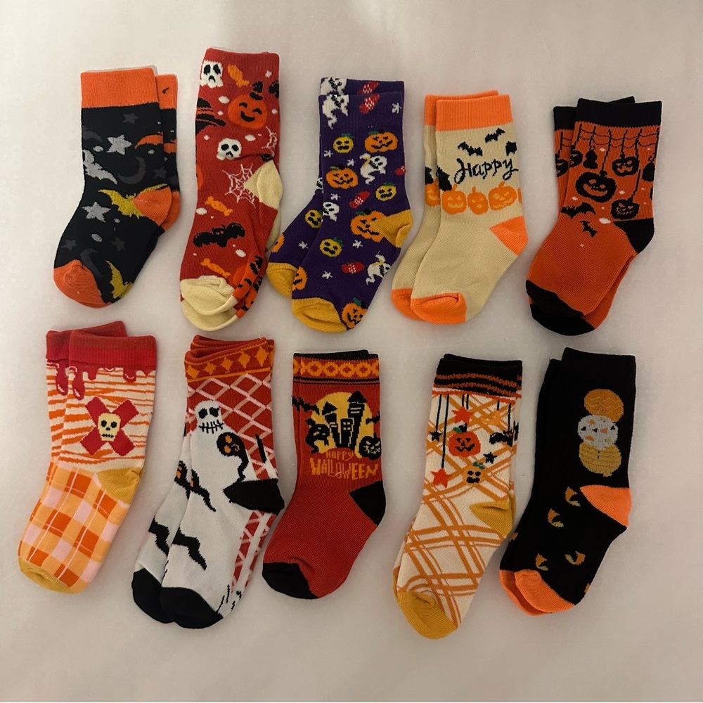 10 pairs of toddler Halloween socks.